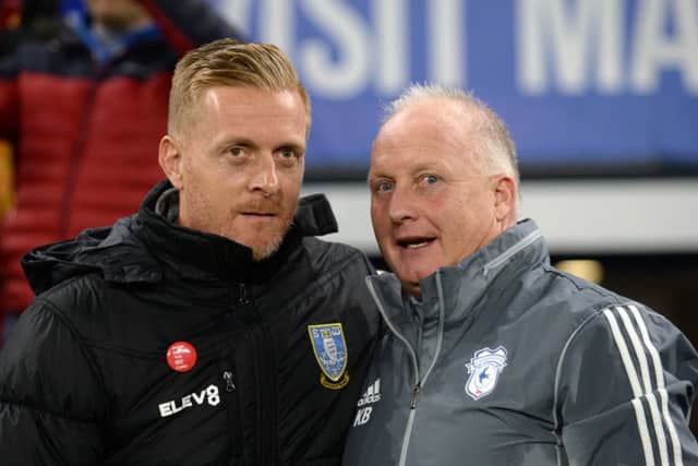 Sheffield Wednesday manager Garry Monk chats with former Sheffield United and Leeds United boss Kevin Blackwell, now assistant at Cardiff City. Picture: Steve Ellis