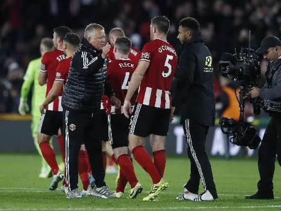 Chris Wilder congratulates Jack O'Connell after Sheffield United's 1-0 win over Arsenal