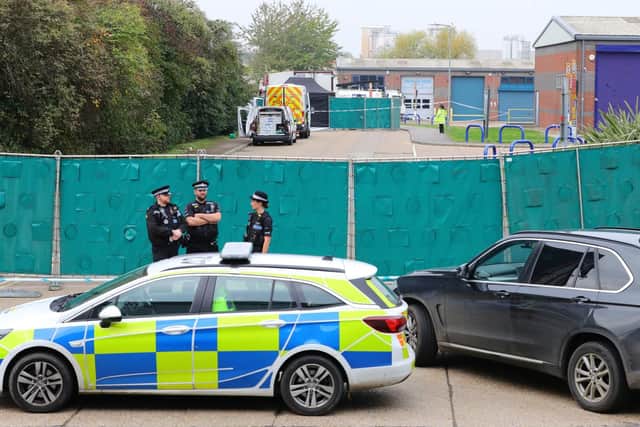 Police at the scene where 39 bodies were found in a lorry container in Essex