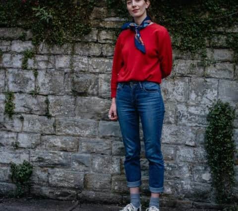 Events extraordinaire and interim manager at Sheffield Creative Guild Oriana Franceschi in her garden, wearing a vintage silk scarf and shoes with red cashmere jumper from the Glasgow Vintage Co. Image by Madeleine Winters.