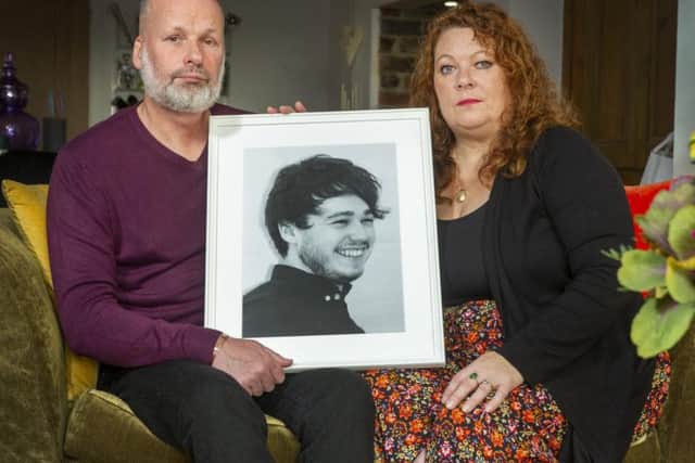 Andrew and Joanne Doody from Wyke, with a portrait of their son Peter who died suddenly in May at the age of 21. His parents, forming the Peter Doody Foundation, hope to raise awareness of sudden unexpected death in epilepsy and support other families. Picture Tony Johnson