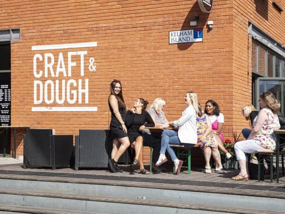 Summer drinkers outside Craft & Dough