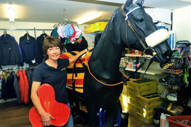 Wendy Hoggard the Owner of White Rose Saddlery in her shop  at Norton.