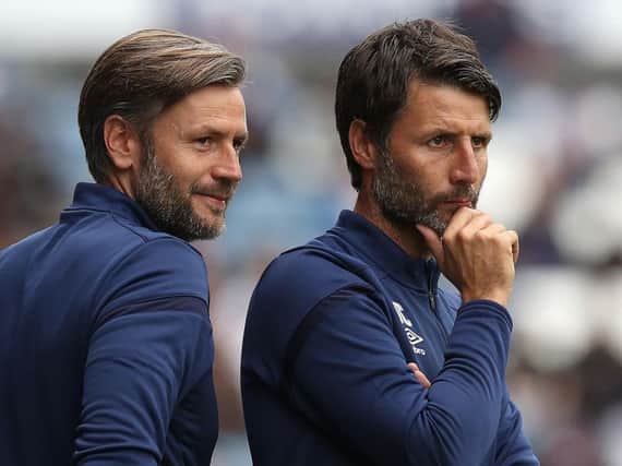 Huddersfield Town manager Danny Cowley (right) and assistant and brother Nicky (left)