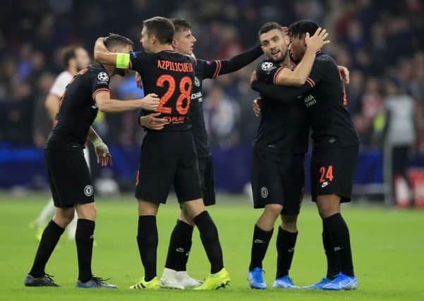 Chelsea players celebrate in Amsterdam. Picture: AP Photo/Peter Dejong