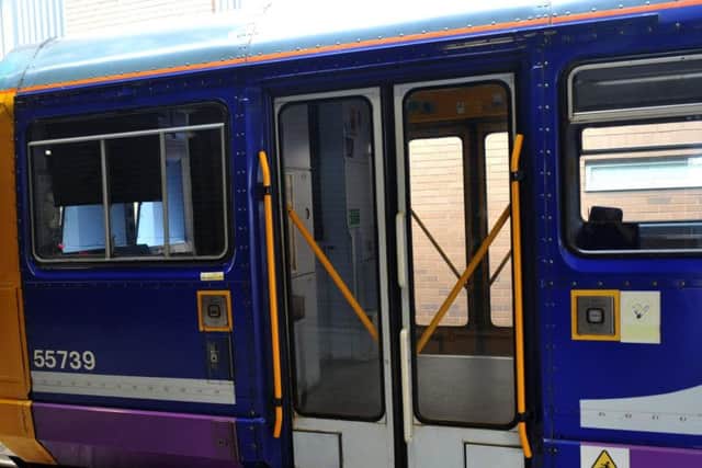 A Pacer train with its original 1980s folding doors