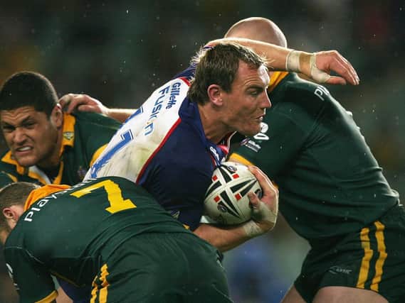 Great Britain's Gareth Ellis takes on Australia's defence with Willie Mason in the background during the 2006 Tri-Nations epic. (Photo by Matthew King/Getty Images)