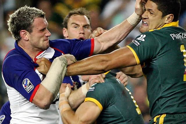 Great Britain's Jamie Peacock and Australia's Jamie Peacock trade punches during the 2006 battle. (GREG WOOD/AFP via Getty Images)