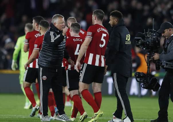 Sheffield United boss Chris Wilder congratulates his players after beating Arsenal at Bramall Lane. Picture: Simon Bellis/Sportimage