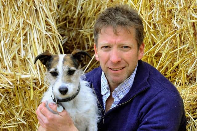 Julian Norton, pictured with his own dog Emmy. Picture by Gary Longbottom.