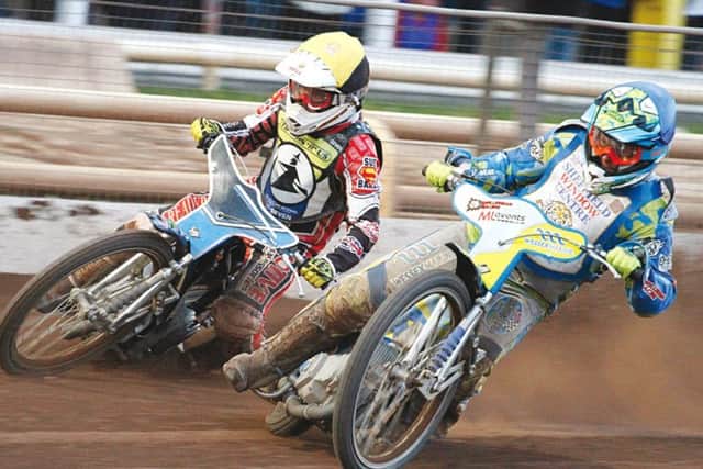 Sheffield Tigers' Kyle Howarth takes the inside line on rival Ben Barker. Picture courtesy of Sheffield Tigers.