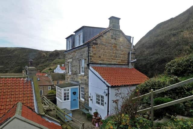 The cottage is tucked away and is rare as it is one of the few in Staithes with a garden