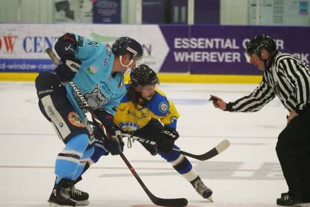 WE MEET AGAIN: Leeds Chiefs' Steven Moore prepares to face off against Sheffield Steeldogs' Nathan Salem during last month's NIHL National encounter at Ice Sheffield. 
Picture: Chris Stratford