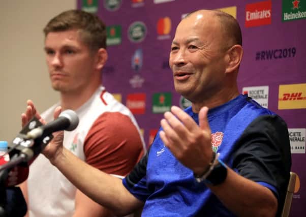 England's Owen Farrell (left) and head coach Eddie Jones during a press conference.