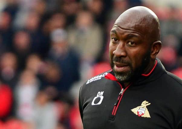 Doncaster Rovers manager Darren Moore: Wary.