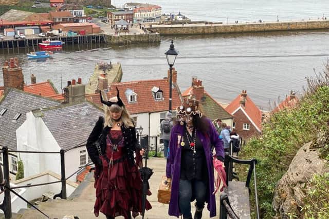 Goth sisters Maria Owen and Cath Simpkins, from Chester and York, climb the 199 Steps to Whitby Abbey
