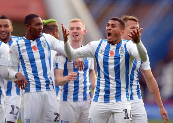 Goal: Huddersfield's Karlan Grant celebrates his goal against Barnsley. Picture: Graham Crowther