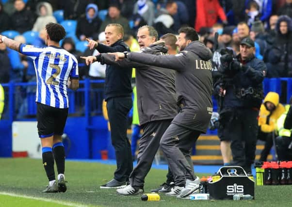 Leeds United manager Marcelo Bielsa (centre) and Garry Monk on the touchline at Hillsborough on Saturday. Picture: Danny Lawson/PA