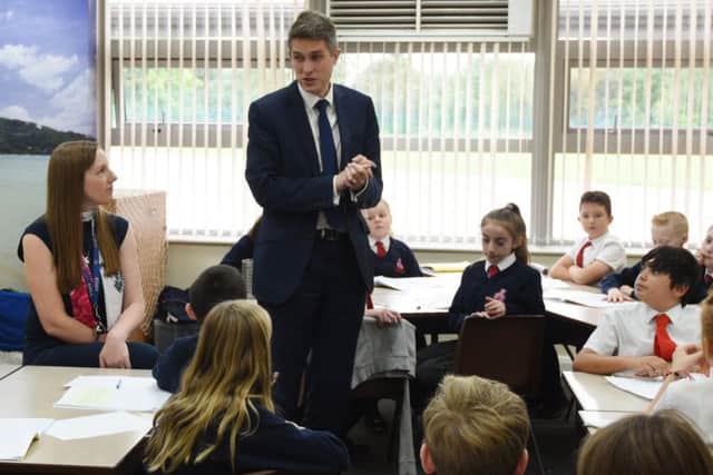 Gavin Williamson, pictured during a recent school visit, wants to give greater opportunities to young people who grow up in care.