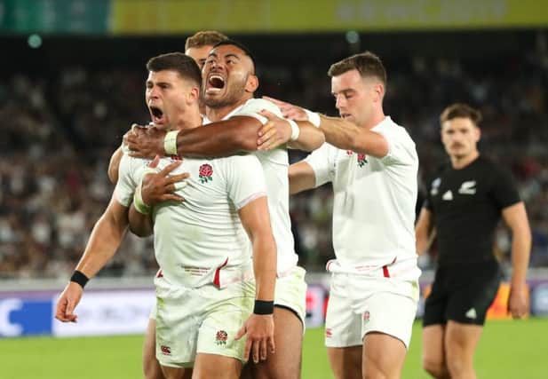 England player Ben Youngs celebrates his try with Manu Tuilagi and George Ford (r) which is later disallowed during the Rugby World Cup 2019 Semi-Final match between England and New Zealand Photo by Stu Forster/Getty Images