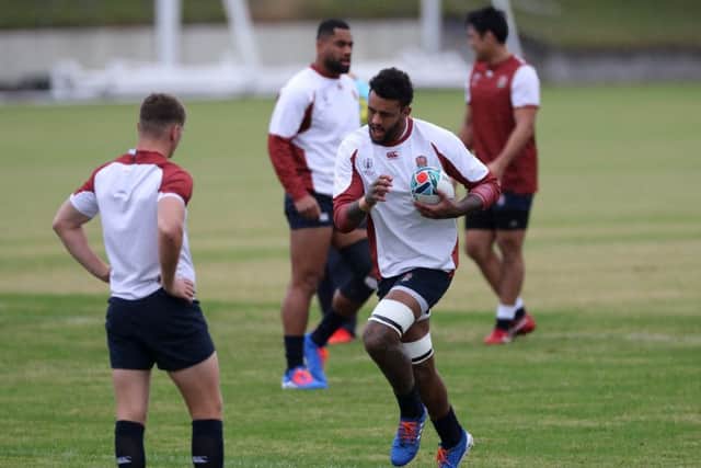 GETTING READY: Courtney Lawes runs with the ball during the England training session at Fuchu Asahi Football Park in Tokyo. Picture: David Rogers/Getty Images.