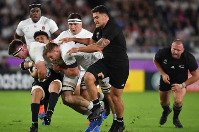 Dynamic duo: England's Tom Curry drives on supported by Sam Underhill against New Zealand.