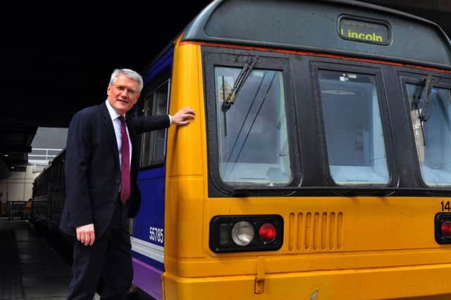 Harrogate and Knaresborough MP Andrew Jones is a former Rail Minister - he is pictured at Leeds Station with a Pacer train.