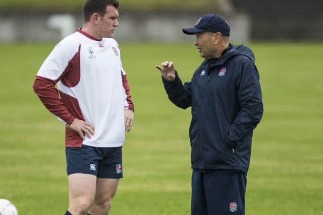 BIG RIVAL: England head coach Eddie Jones, right, during a training session at the Fuchu Asahi Football Park. Picture: Odd Andersen/AFP via Getty Images
