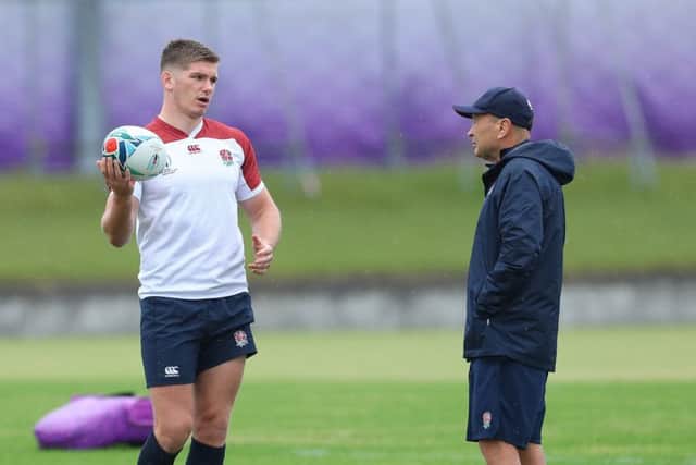 England captain Owen Farrell talks with head coach Eddie Jones during a training session at Fuchu Asahi Football Park earlier this week. Picture: Shaun Botterill/Getty Images