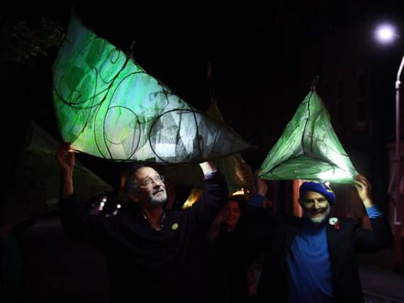 Extinction Rebellion York procession through the city of York carrying giant, leaf-like lanterns, previously used in a visually stunning display at Askham Bog to raise awareness about protecting the area against harmful development plans. 
Pictured Andreas Heinemeyer.