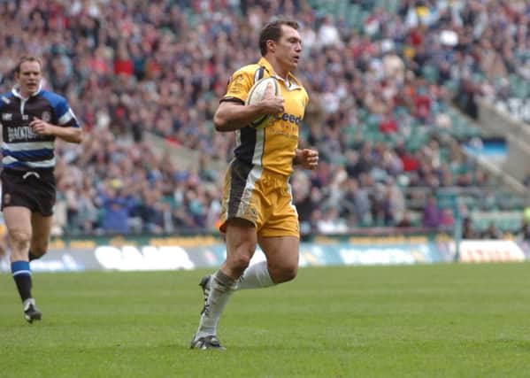 Powergen Cup final hero: Leeds Tykes' Andre Snyman crosses for a try against Bath.