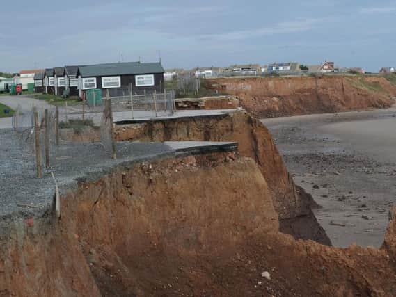 Homes left on a cliff edge due to coastal erosion at Withernsea. Picture by Simon Hulme.