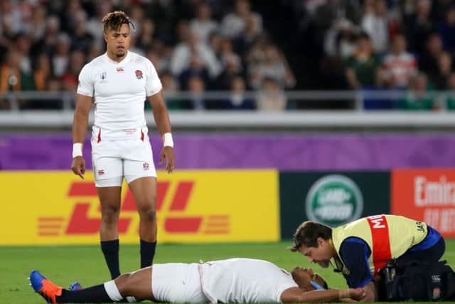 England's Kyle Sinckler receieves medical attention after taking a blow to the head. Picture: Adam Davy/PA