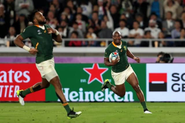 South Africa's Makazole Mapimpi (right) runs in to score his sides first try at Yokohama Stadium. Picture: David Davies/PA