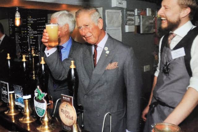 Prince Charles during a past visit to the George & Dragon.