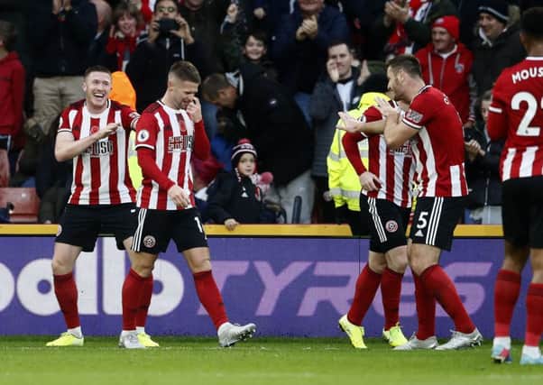 THAT'S FOR STARTERS: Sheffield United's John Lundstram celebrates his first goal against Burnley at Bramall Lane. Picture: Simon Bellis/Sportimage