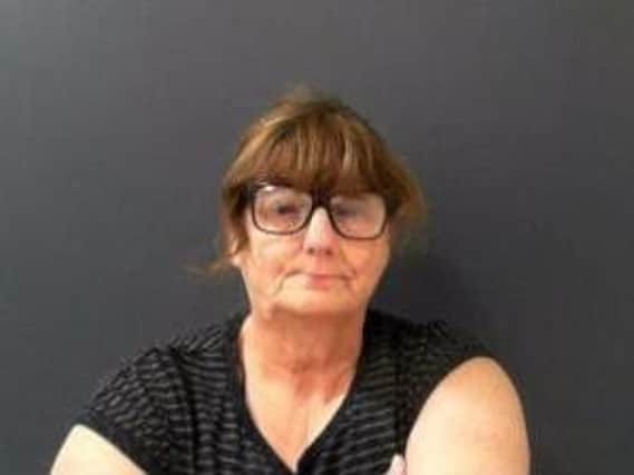 Joan Garbutt, 59, posed as a carer and friend to the elderly woman, convincing her to give her access to her bank account so she could manage her finances.