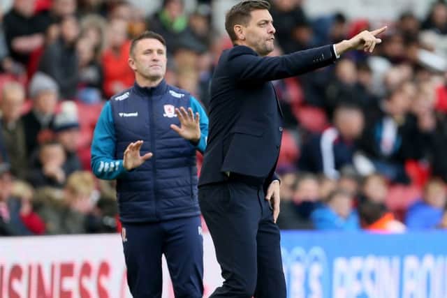 Middlesbrough assistant Robbie Keane with manager Jonathan Woodgate (right) during the Sky Bet Championship match at Riverside Stadium, Middlesbrough. (Picture: Richard Sellers/PA Wire)