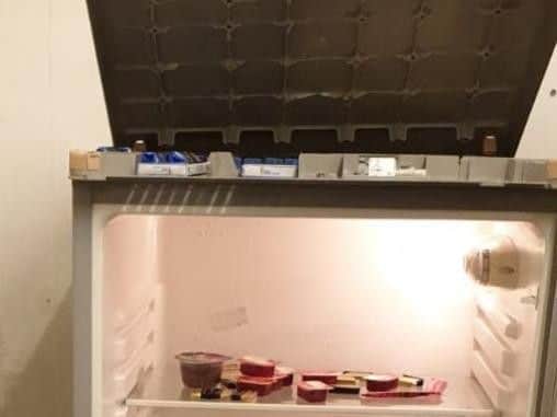 The illegal cigarettes were found hidden on top of fridges, behind false shelves, behind remote controlled walls, inside food containers, buried in gardens and inside false drawers or around door frames, police have revealed.