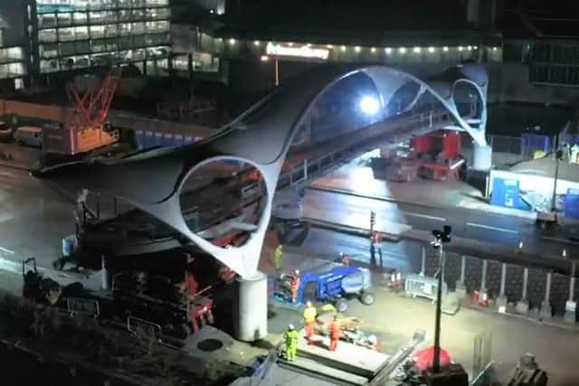 A screengrab of the video showing the Princes Quay bridge being installed. Credit: Highways England