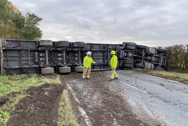 The A59 is closed after a crash left a HGV flipped onto its side. Photo credit Andy Creasey, Station Manager with North Yorkshire Fire & Rescue Service, @fireyfella.