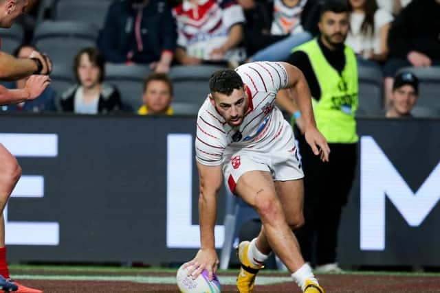 Jake Connor scores for England Nines against Wales in Sydney (SWPIX)