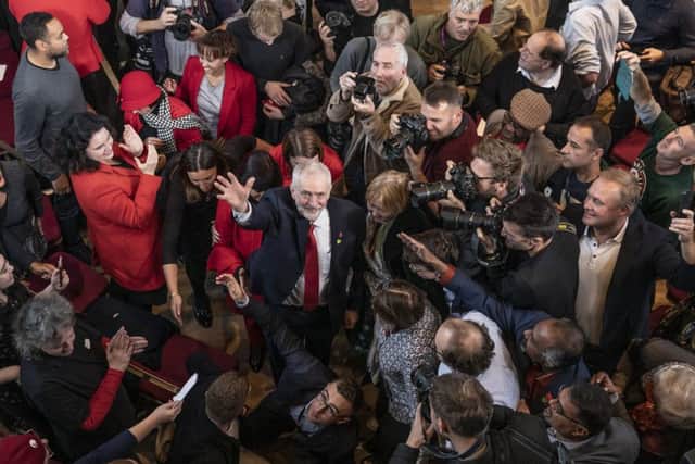 Labour leader Jeremy Corbyn waves to the photographers after speaking at an election campaign at Battersea Arts Centre on October 31, 2019 in Battersea, England. (Photo by Dan Kitwood/Getty Images)