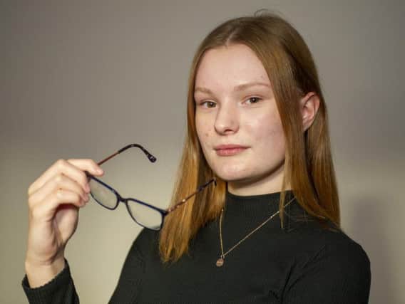 16-year-old eve wears glasses for an eye condition that could have been prevented if caught early enough. Pic: Tony Johnson