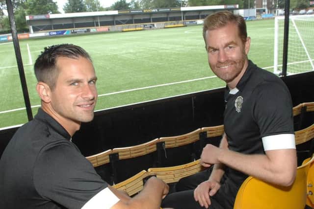 Paul Thirlwell, left with Harrogate Town manager Simon Weaver, thinks the Wetherby Road pitch could help his side in their televised FA Cup first-round tie against Portsmouth