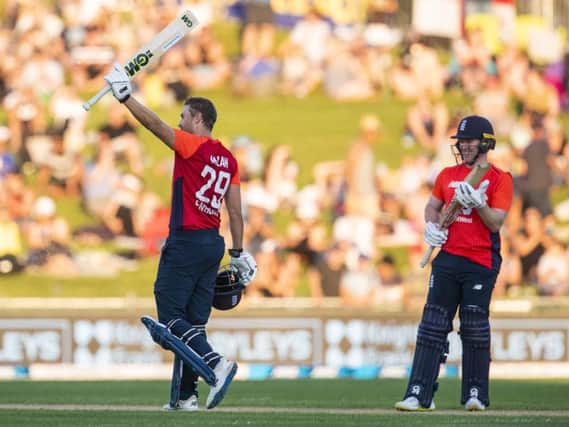 Century salute: Dawid Malan after completing his 100.