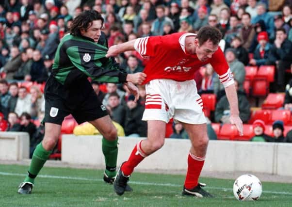 Barnsley's Brendan O'Connell and Stoke's John Dreyer battle for possession at an Oakwell meeting between the two sides back on Boxing Day 1995 which the Reds won 3-1. Picture: Sharon Doorbar/Ross Parry.