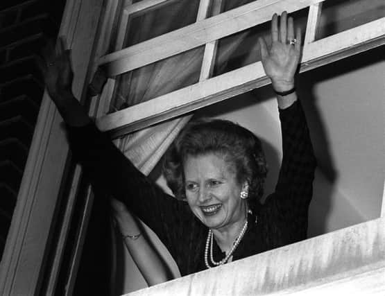 Margaret Thatcher waves to well-wishers after her 1983 election win