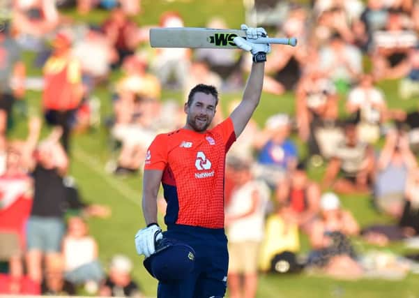 England's Dawid Malan celebrates 100 runs during the Twenty20 cricket match between New Zealand and England at McLean Park in Napier (Picture: MARTY MELVILLE/AFP via Getty Images)