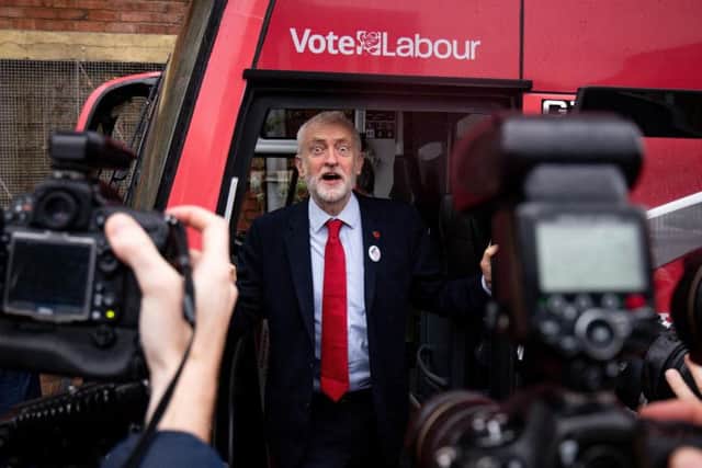 Labour leader Jeremy Corbyn unveils the Labour battle bus while on the General Election campaign trail in Liverpool. Photo: Jacob King/PA Wire
